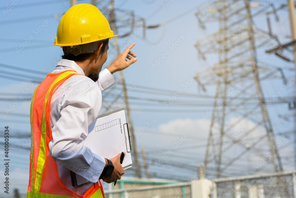 Asian Engineer Construction are Worker employee Worker By safety control helmet on site building Asian Engineer Construction are Worker employee Worker By safety control helmet on site building