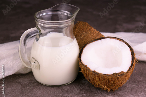 
Coconut milk in a small jug.
Close-up.
