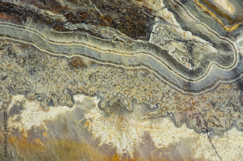 Beautiful colorful pattern in slice of agate rock for background