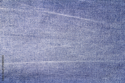 Blue denim textile background. Blue jeans texture.