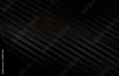 Carbon fiber texture background with right light Carbon fiber composite raw material background