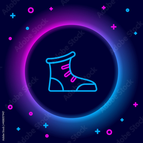 Glowing neon line Sport boxing shoes icon isolated on black background. Wrestling shoes. Colorful outline concept. Vector.