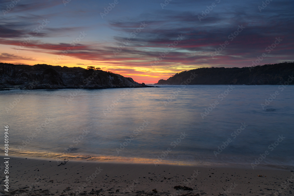 Colourful High Cloud Sunrise Seascape and Rock Formations Colourful High Cloud Sunrise Seascape and Rock Formations