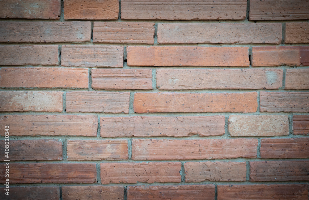 Close-up of antique brick block wall textured pattern with vignetted for backgrounds and text design. Close-up of antique brick block wall textured pattern with vignetted for backgrounds and text design.