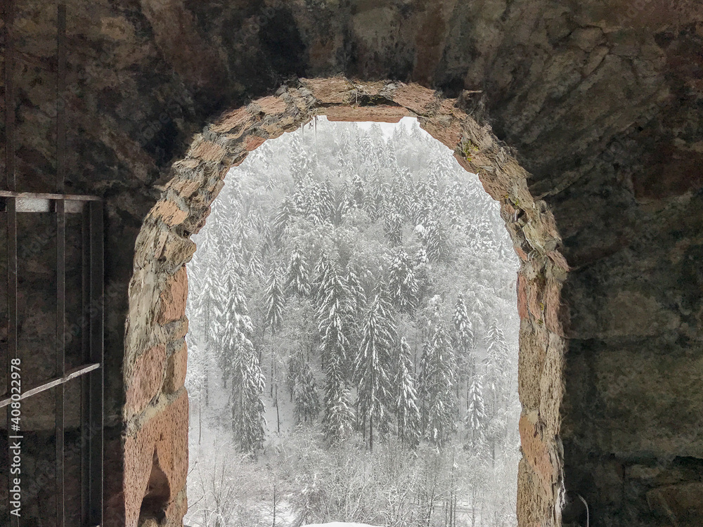 Fototapeta premium View through the arch of a castle