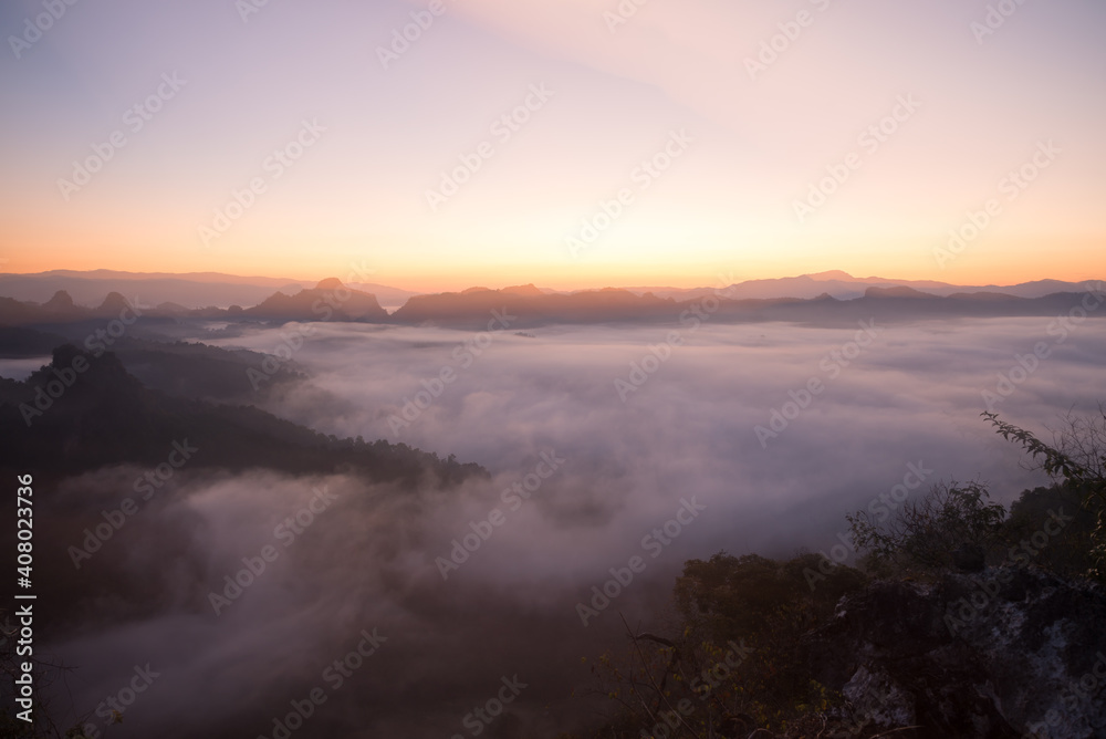 Beautiful mist on the top of mountain in the sunrise morning at Ban Jabo Maehongson, northern Thailand. Travel nature concept. Beautiful mist on the top of mountain in the sunrise morning at Ban Jabo Maehongson, northern Thailand. Travel nature concept.