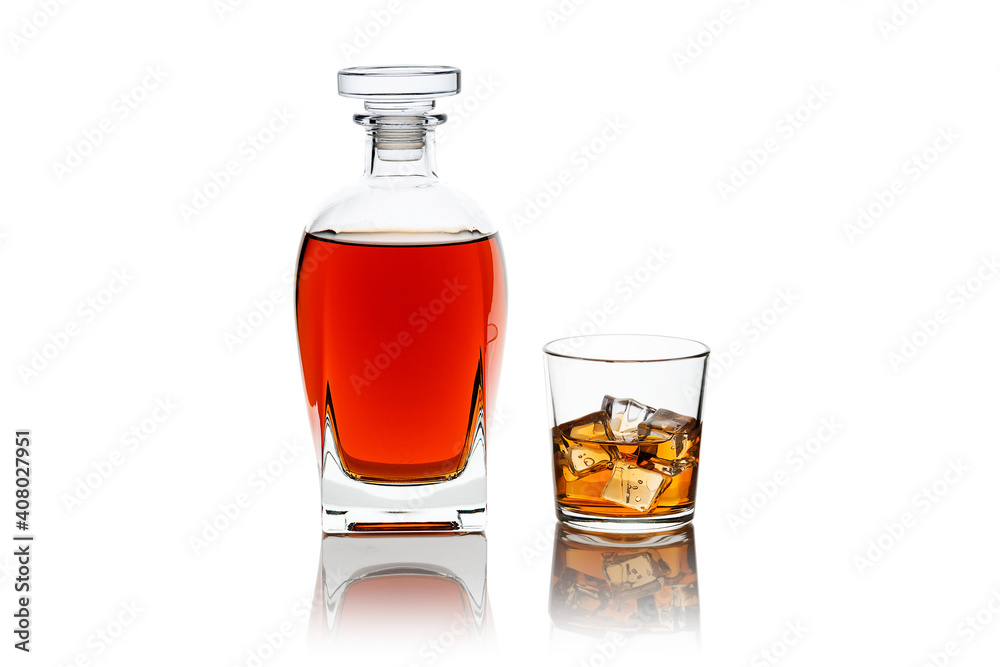 Bottle and glass of scotch whiskey and ice isolated on white background Bottle and glass of scotch whiskey and ice isolated on white background