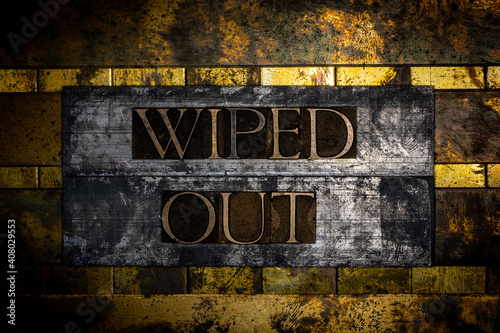 Wiped Out text on vintage textured silver grunge copper and gold background