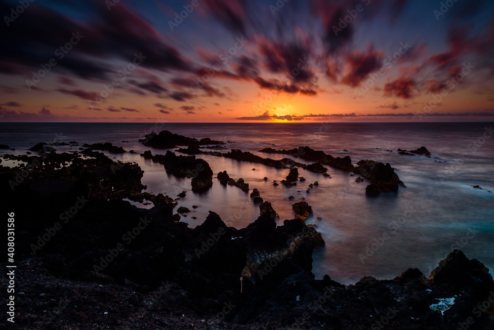 sunset on the ocean.
panorama of the coast in azores islands during sunset. portugal