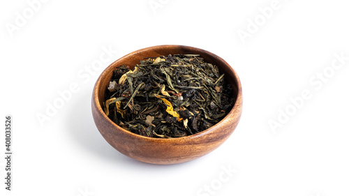 Green Tea in wooden bowl isolated on a white background.