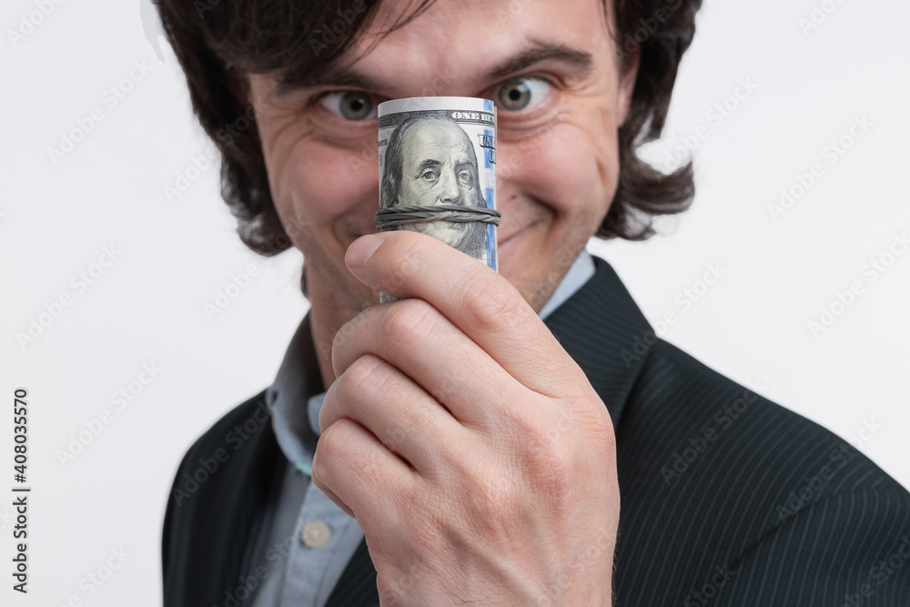 Crazy man looking on money bundle. Happy winner with prize Crazy man looking on money bundle. Happy winner with prize