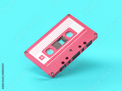 Fotografiet Pink vintage audio cassette on blue background.