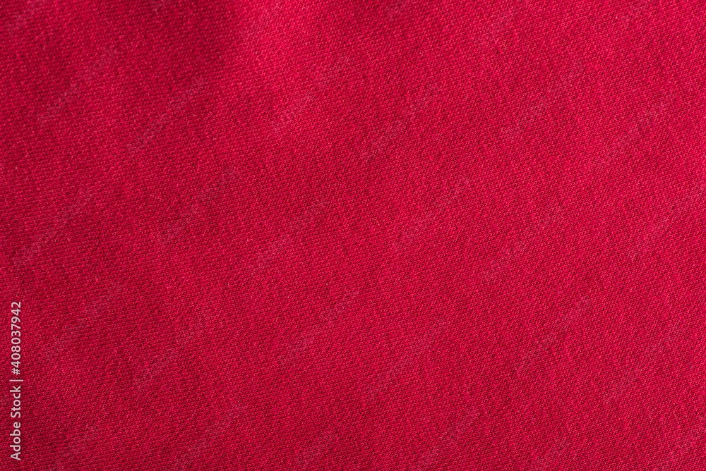 Fototapeta premium Red cotton cloth. Fabric texture, textile background