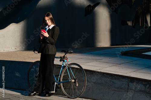Woman using her mobile phone outdoors.