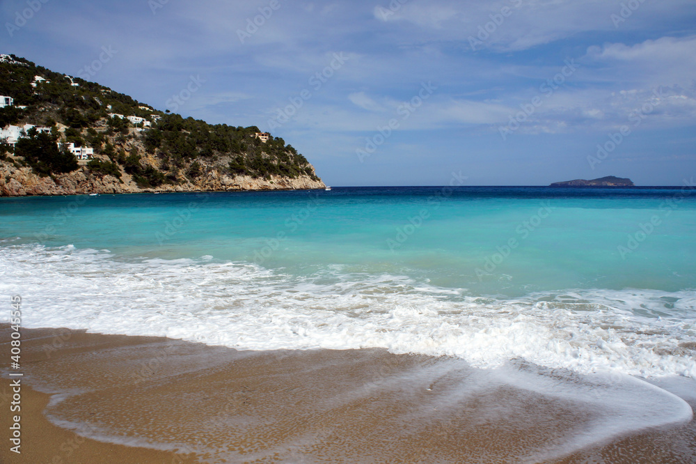 Obraz premium The blue water of the bay on the north coast of Ibiza.Spain