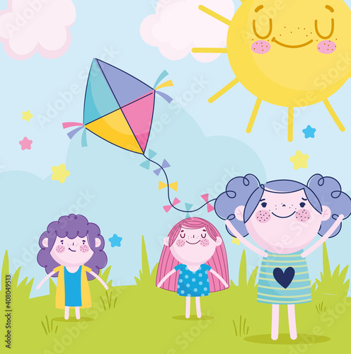 cute girls and boy playing with kite in the park, children
