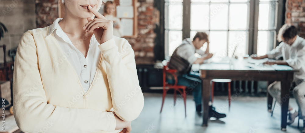 Office business team concept. Handsome wondered woman manager. Wide screen orientation Office business team concept. Handsome wondered woman manager. Wide screen orientation