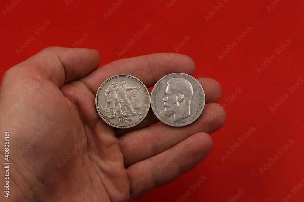 Old Russian silver coins in hand Old Russian silver coins in hand