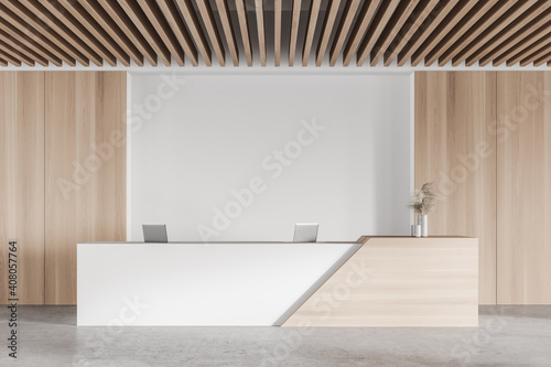 White and wooden office waiting room with reception