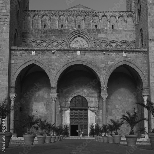 Cefalù, Sicilian tourist destination. Medieval Sicily. Duomo and views of the streets. Votive shrines, Saints and Madonnas. Details of Sicily. photo