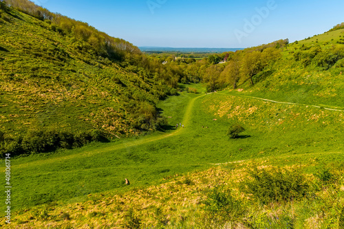 Looking down the longest, widest dry valley in the UK towards the clay Weald on the South Downs near Brighton in springtime