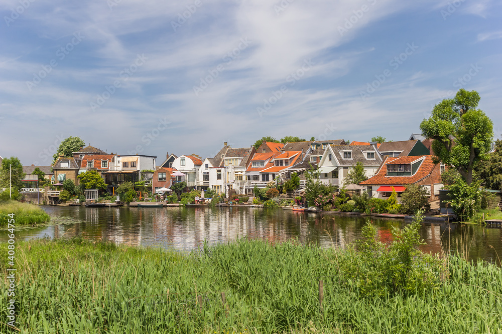 Houses at the river Vlist in Haastrecht, Netherlands
