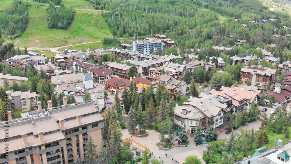 Vail city center and surrounding mountains, Colorado. Aerial view from drone in summer season