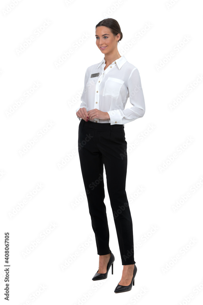 female hotel receptionist standing and smiling politely isolated on white background female hotel receptionist standing and smiling politely isolated on white background