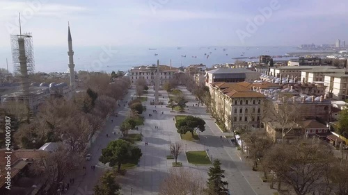 Image of Theodoseus obelisk with drone, sea and ships in background.