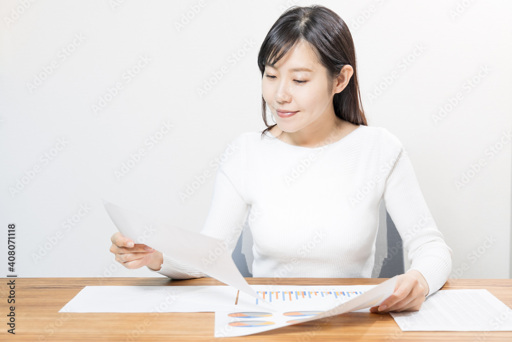 Woman viewing materials at a meeting Woman viewing materials at a meeting