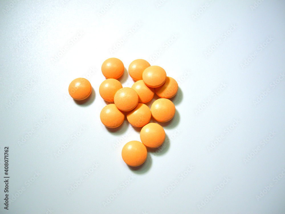 Tablets (dietary supplements) on a white background
