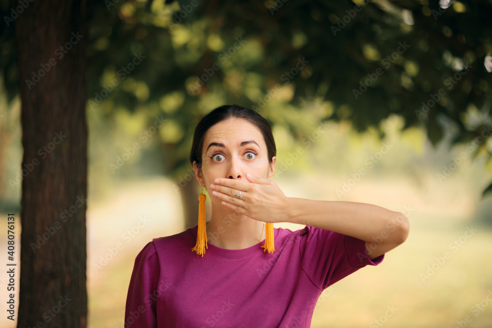 Fototapeta premium Funny Woman Politely Covering her Mouth