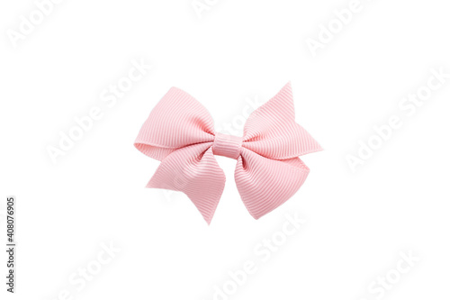 Pink hair bow isolated on white.