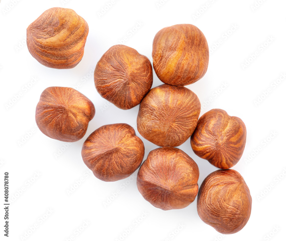 Hazelnuts isolated on white background. Creative food layout. Hazelnut Collection. Top view. Hazelnuts isolated on white background. Creative food layout. Hazelnut Collection. Top view.