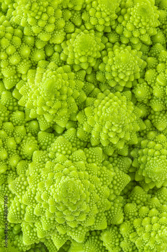Romanesco broccoli or Roman cauliflower textured  background. Healthy  Vegan Food concept. Wallpaper .