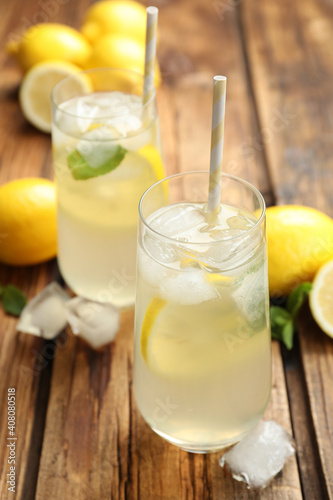 Natural lemonade with mint on wooden table. Summer refreshing drink