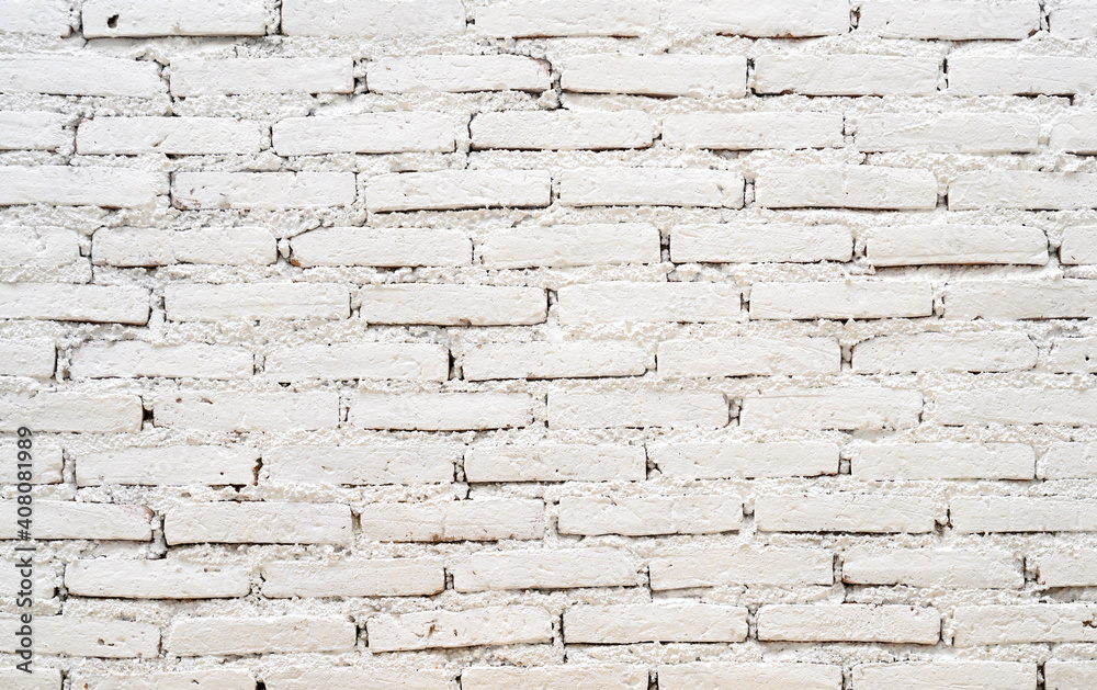 Pattern of white old brick wall.