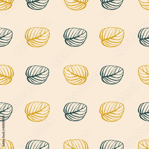 Seamless pattern of yellow and green leaves on a pink background. Autumn template for printing on textiles, fabric, bedding, wrapping paper, covers, wallpaper. 
