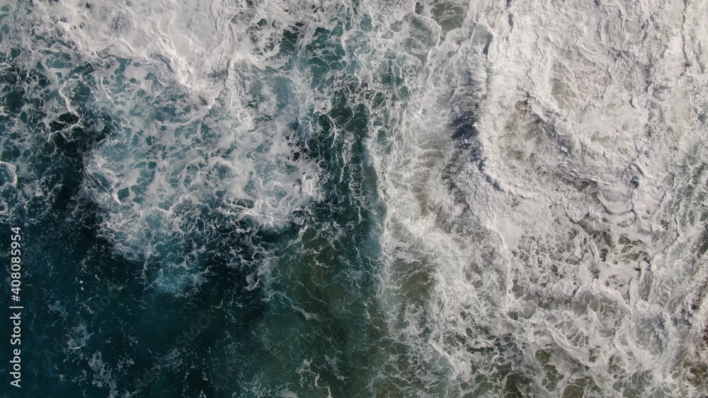 The sea hits the cliffs