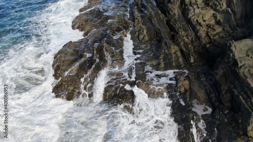 The sea hits the cliffs