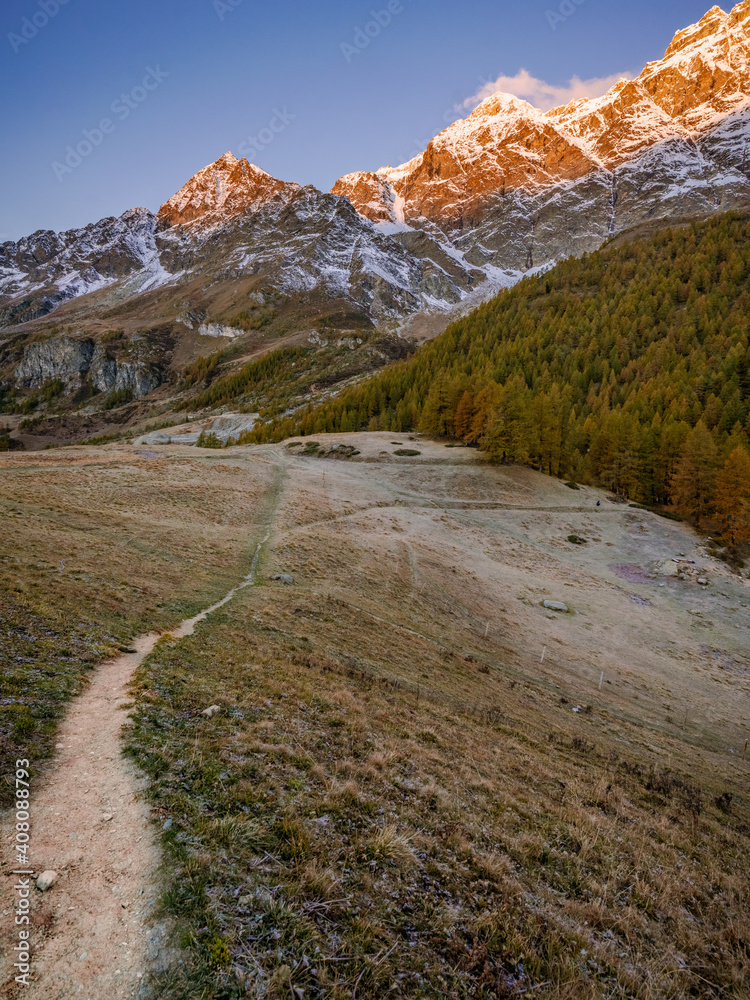 Blue Lake and the surroundings area during the fall and changing of the colors. Foliage, reflection and snowy peaks. Blue Lake and the surroundings area during the fall and changing of the colors. Foliage, reflection and snowy peaks.