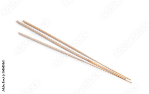 Many aromatic incense sticks on white background