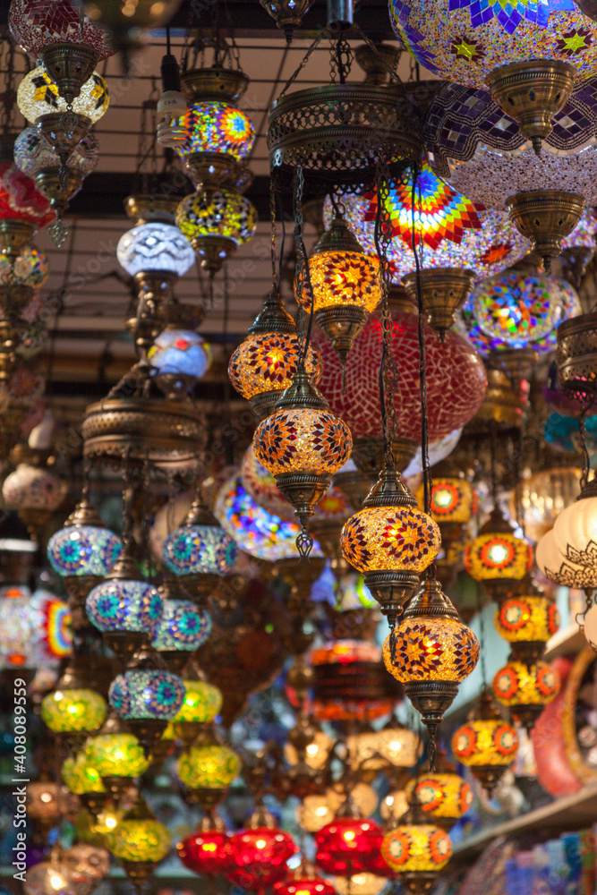 Hanging lamps in Grand Bazaar, Eminonu area in Istanbul, Turkey. The lamps are decorative and very colorful. Traditional lamp concept in Turkey, Ottoman style.