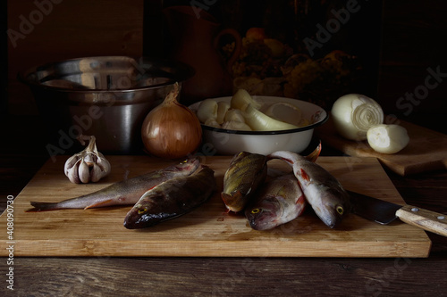 Fresh fish on a wooden table.