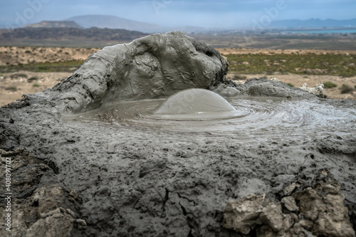 A mud bubble is forming. Gobustan (Qobustan), Azerbaijan. photo