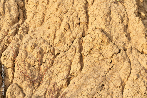 Texture barren earth light brown rock.