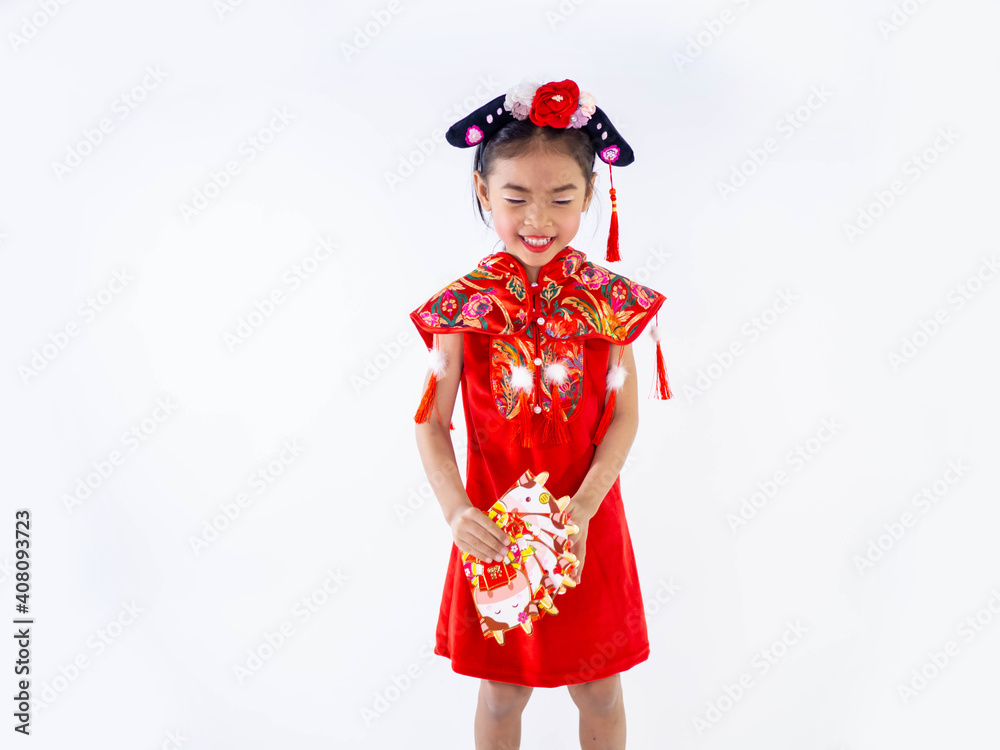 A girl in a qipao dress with her envelopes on white background. A girl in a qipao dress with her envelopes on white background.