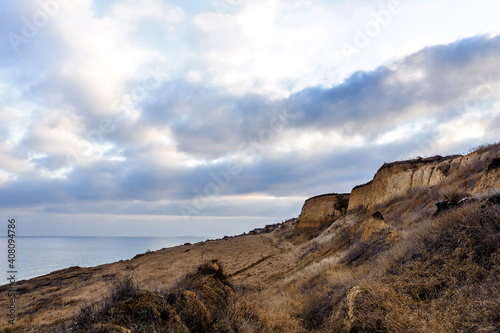 coastal slope overlooking the sea and clouds