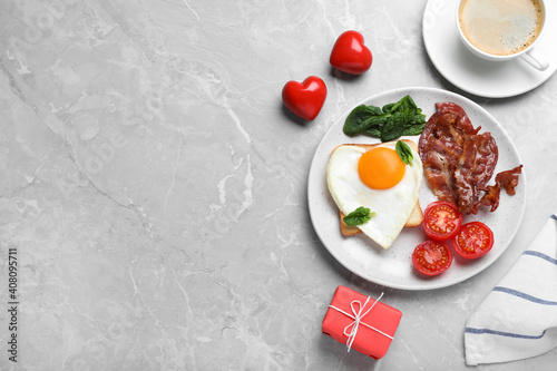 Romantic breakfast on grey table, flat lay with space for text. Valentine's day celebration