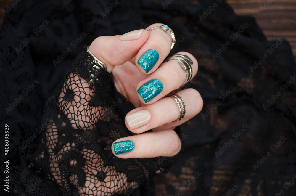 Manicured Woman's Hands Holding Warm Wool Turquoise Fabric. Trendy Winter  Autumn Dark Nail Design. Stock Photo, Picture And Royalty Free Image. Image  130715705.